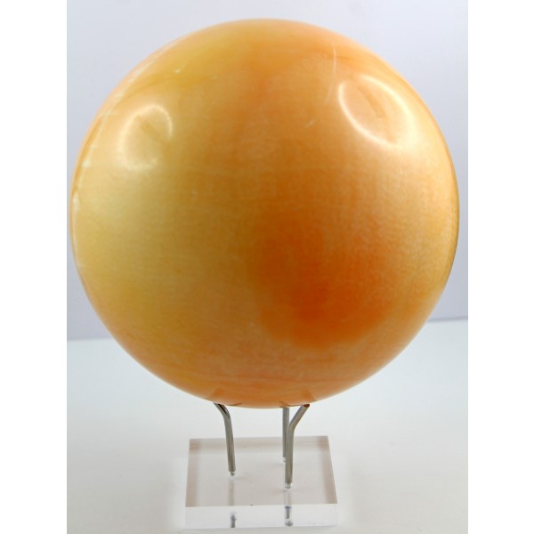 Calcit Kugel pfirsich farbener Naturedelstein handgeschnitzt