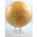 Calcit Kugel pfirsich farbener Naturedelstein handgeschnitzt